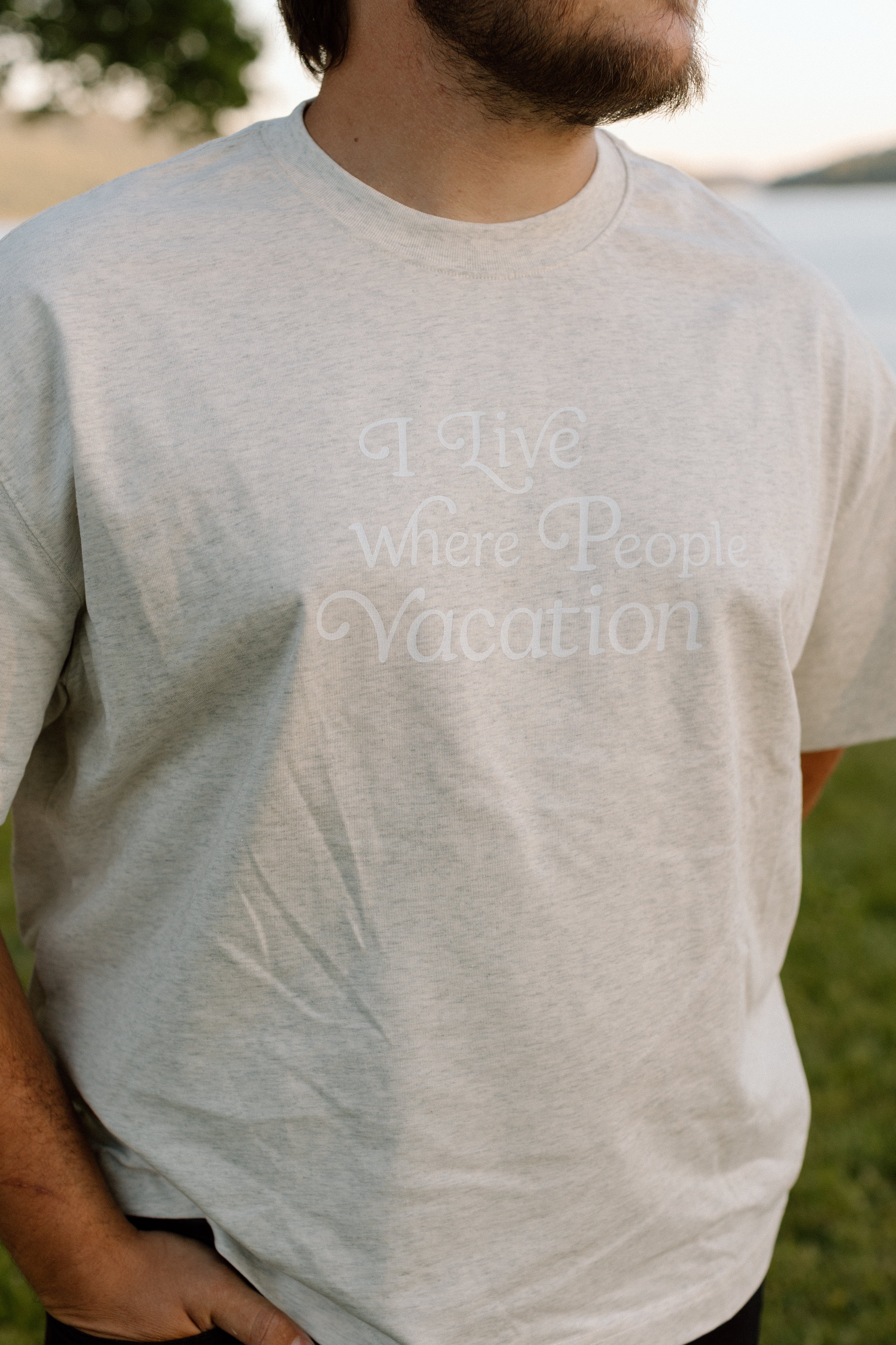 I Live Where People Vacation – Core Tee (Oat Gray Edition)
