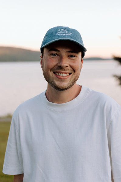 I Live Where People Vacation – Denim Cap