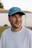 I Live Where People Vacation – Denim Cap