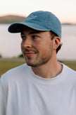 I Live Where People Vacation – Denim Cap