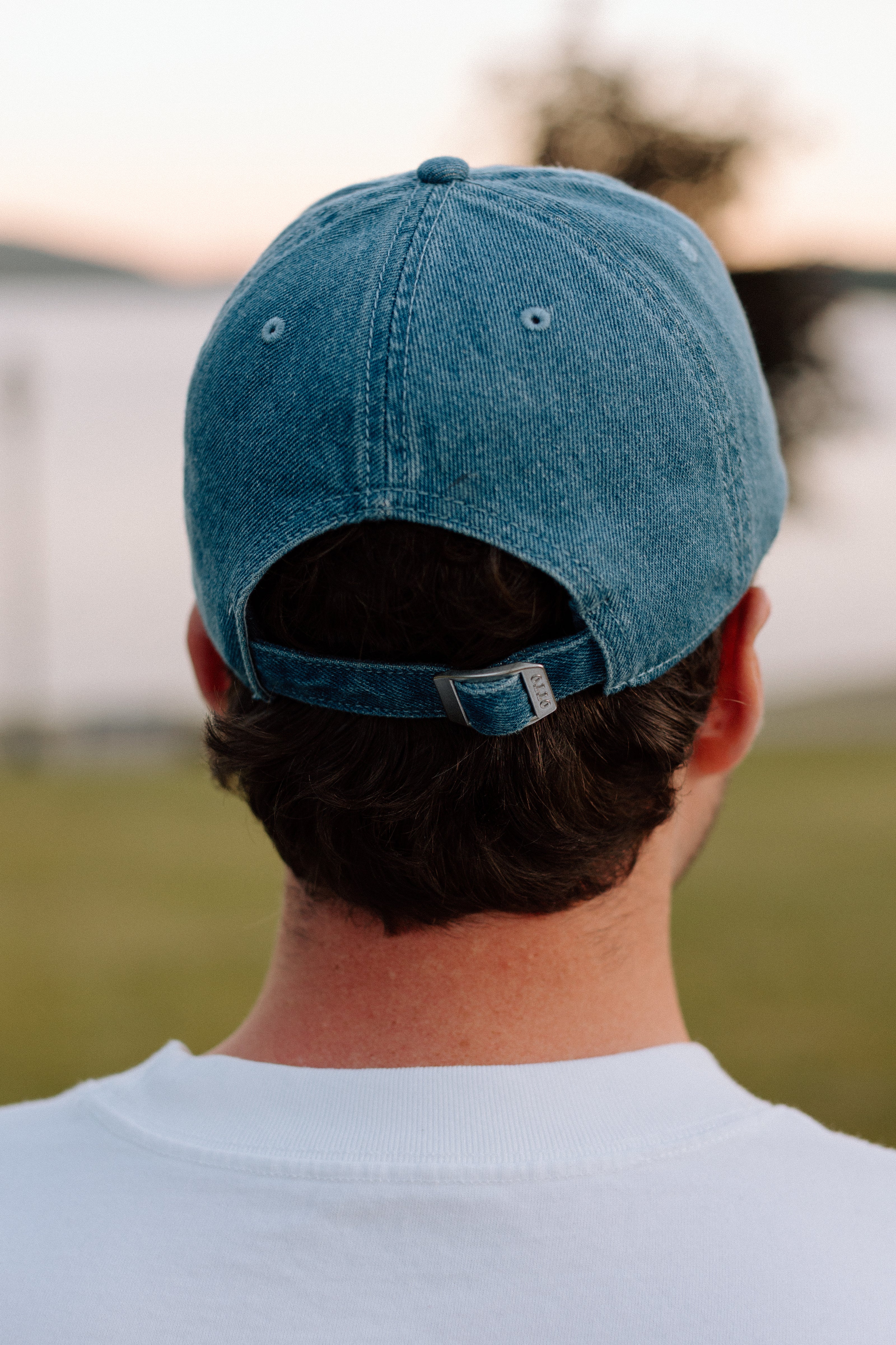 I Live Where People Vacation – Denim Cap