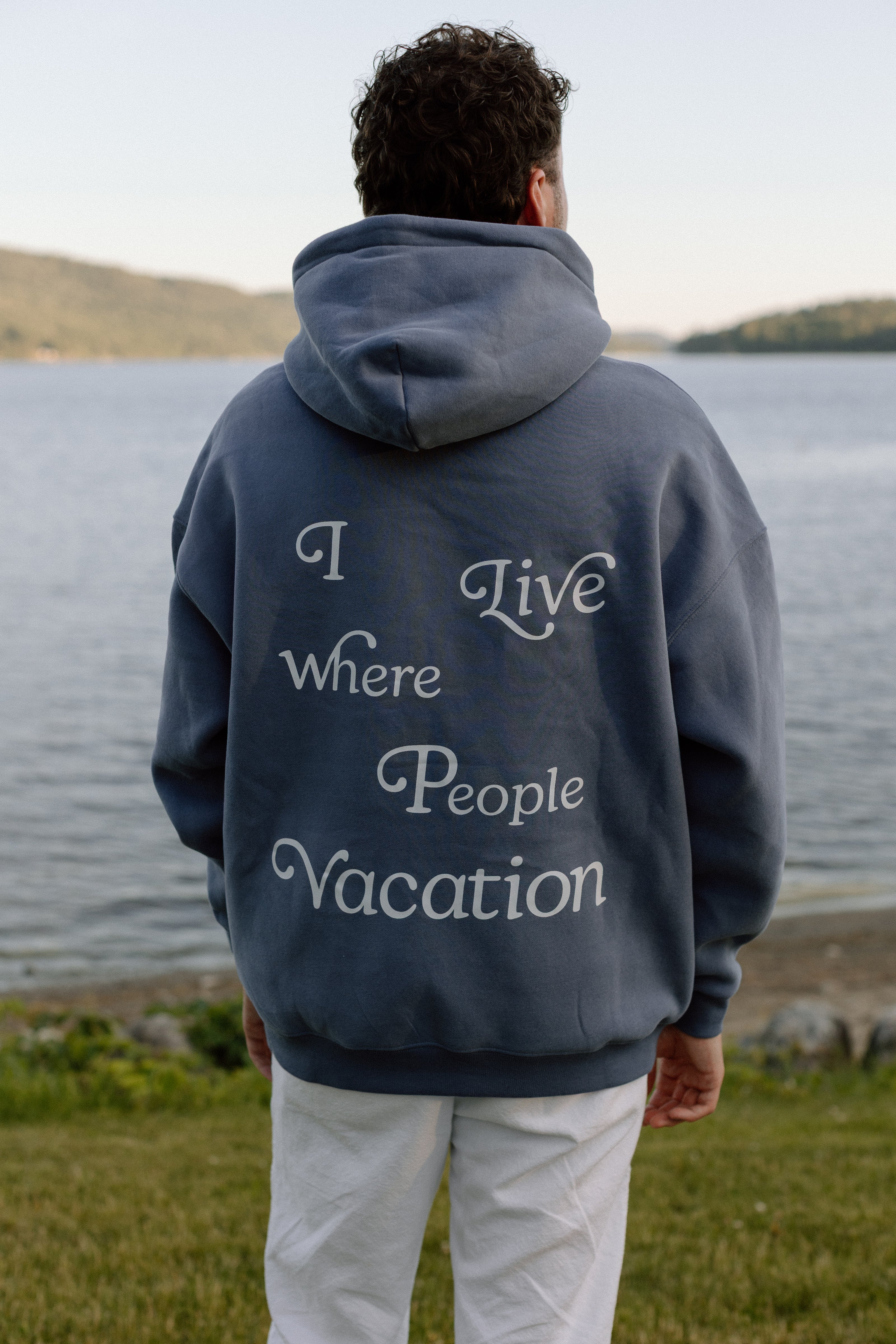 I Live Where People Vacation – Oversized Fleece Hoodie (Jeans Blue)