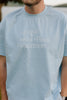 I Live Where People Vacation – Core Tee (Sky Blue Edition)